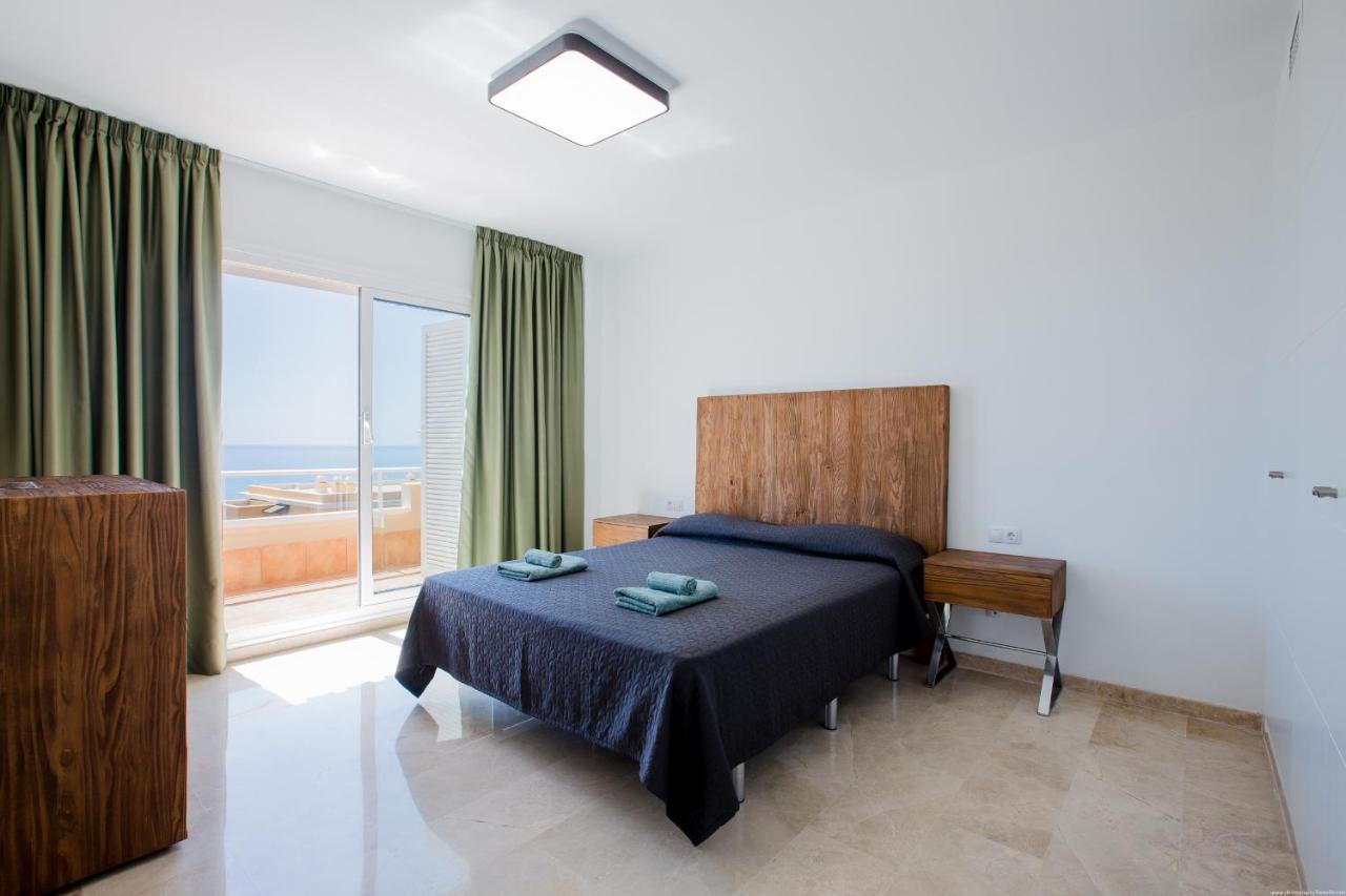 Residencial Playa De La Arena Apartment ปัวร์โตเดซานตีอาโก ภายนอก รูปภาพ